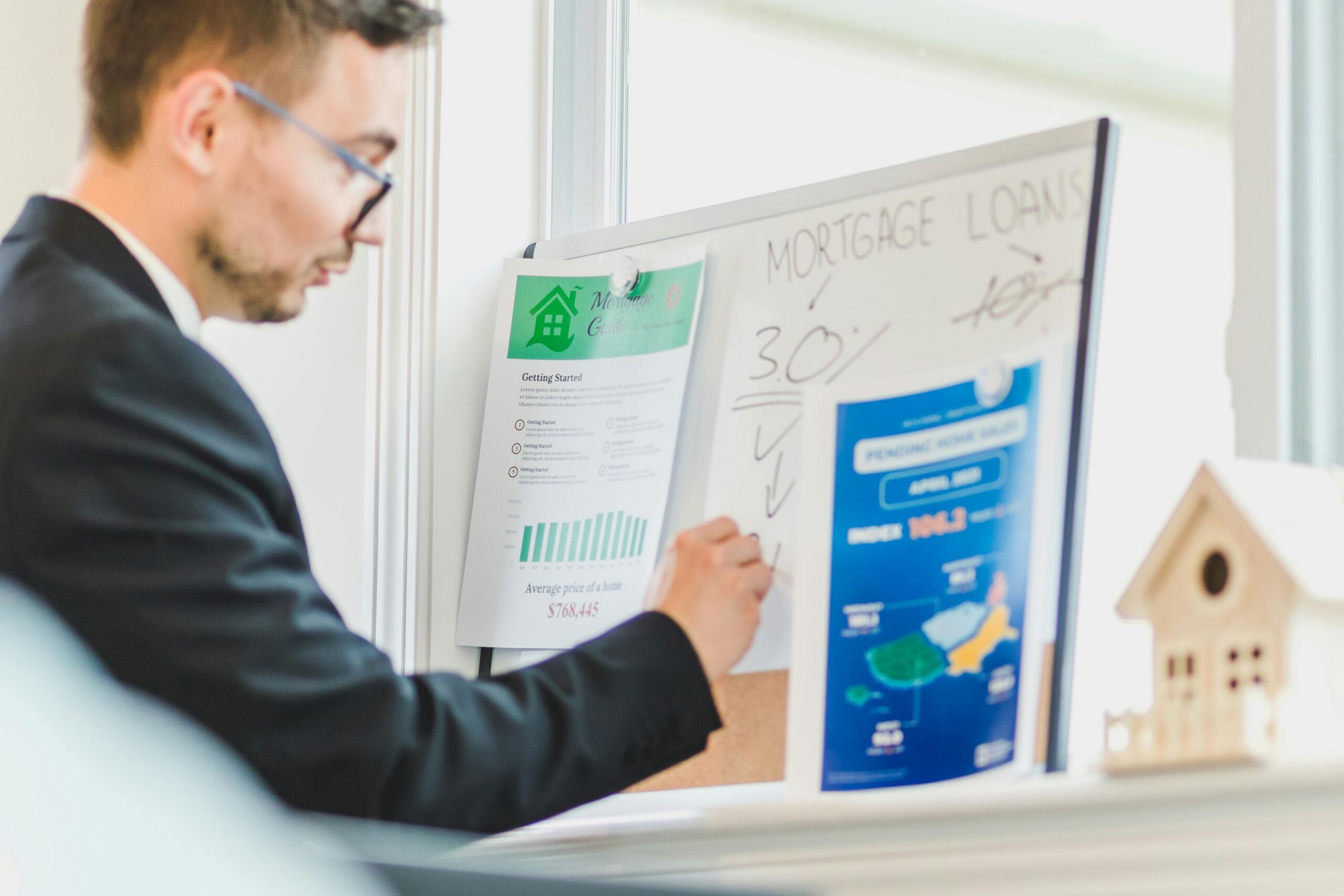male broker explaining split loan