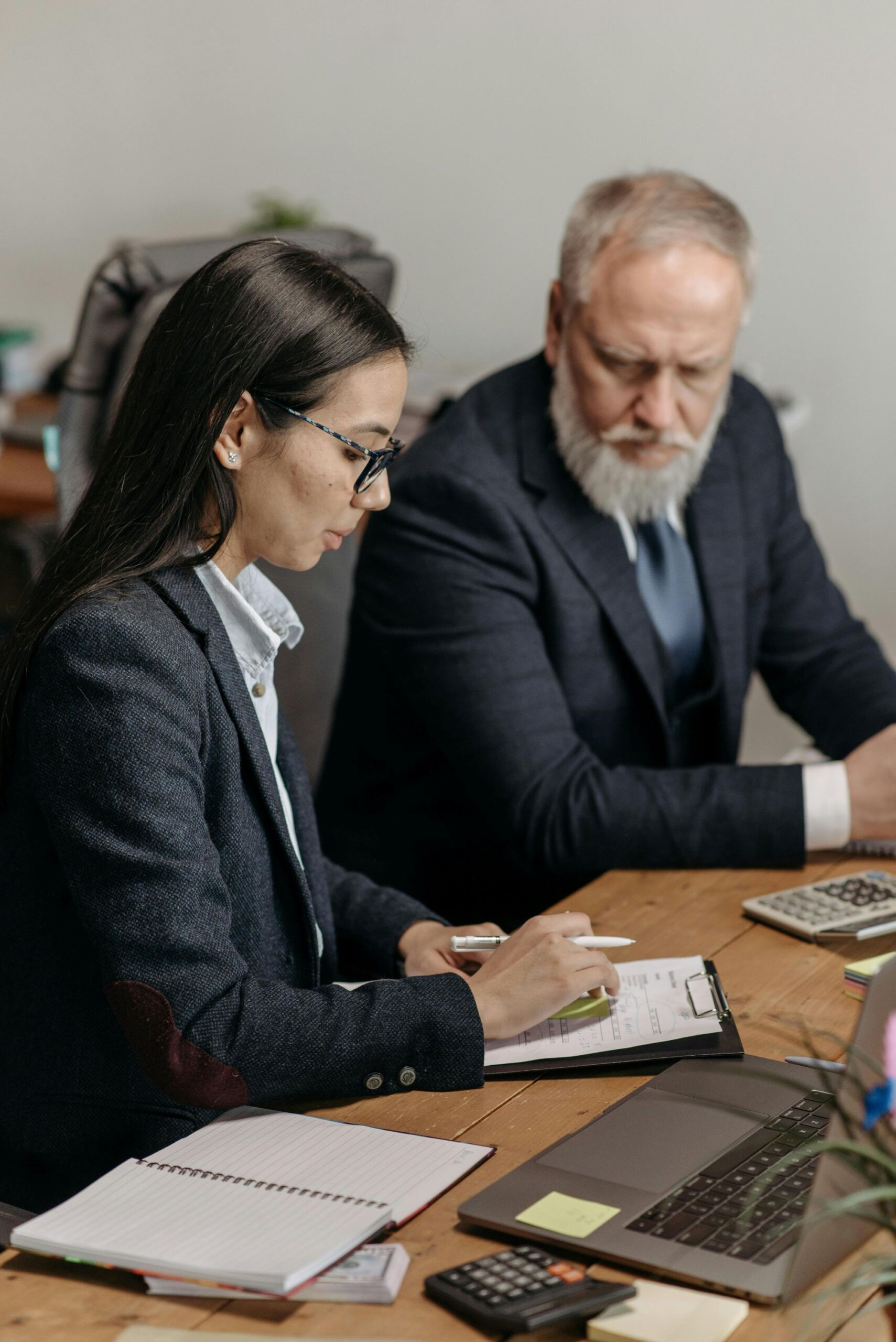 Female agent discussing with male client.