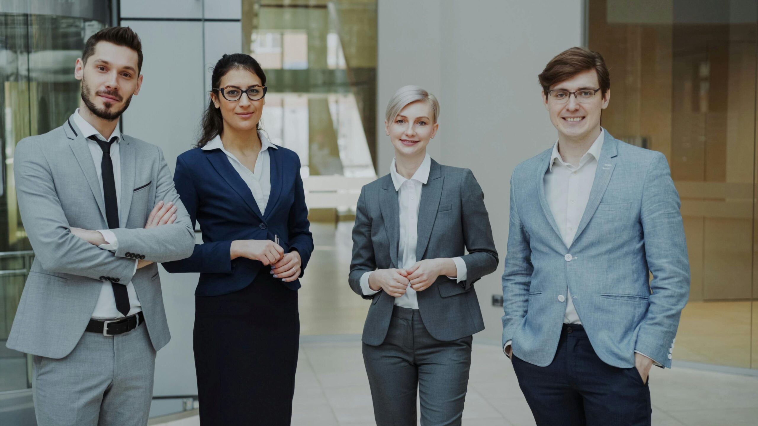 Group of professional men and women standing together